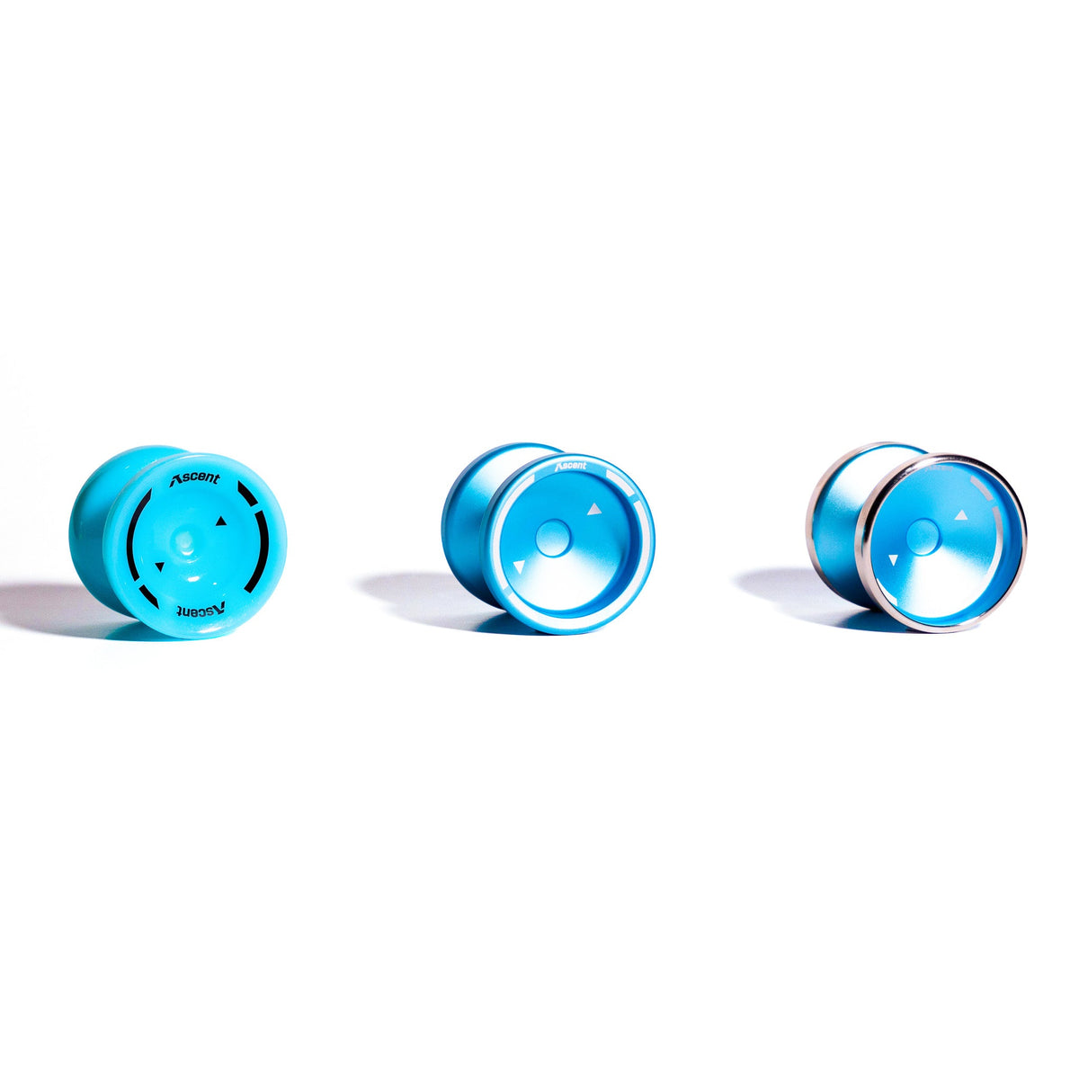 The three Ascent yoyos in the Learn to Yo-Yo in 90 Days kit lined up in Aqua