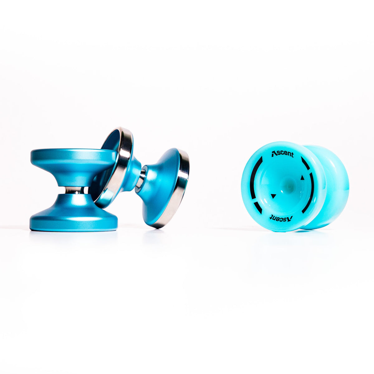 Two Ascent yoyos from the Learn to Yo-Yo in 90 Days kit in Aqua, one shown side on