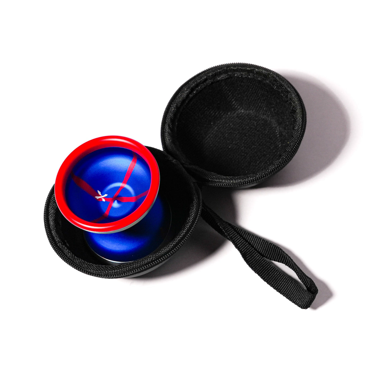 Blue OFFSET Small Hard Case open with a red and blue yoyo in the soft lining