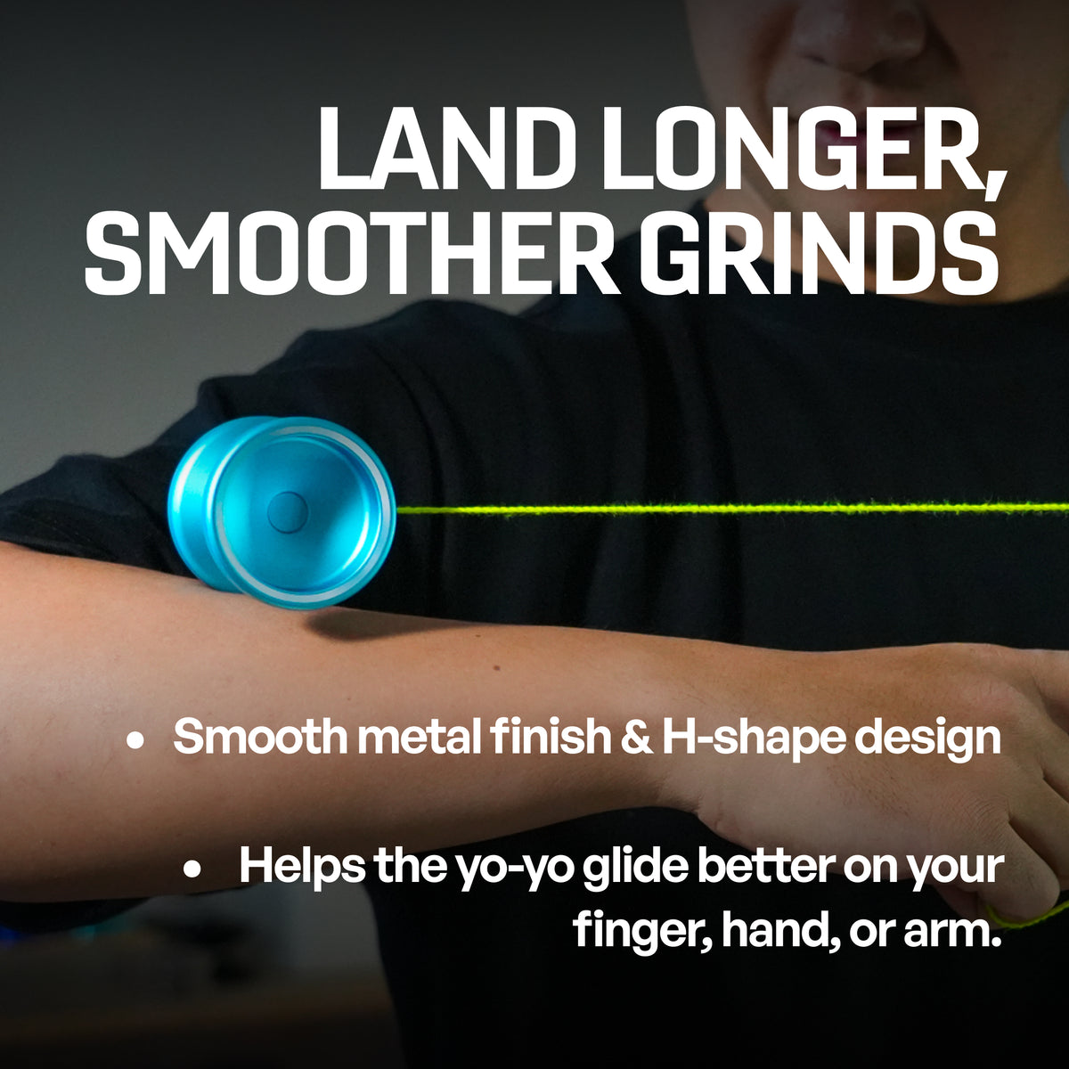 Metal Ascent yoyo in Aqua grinding along an arm, smooth metal finish and H-shape design